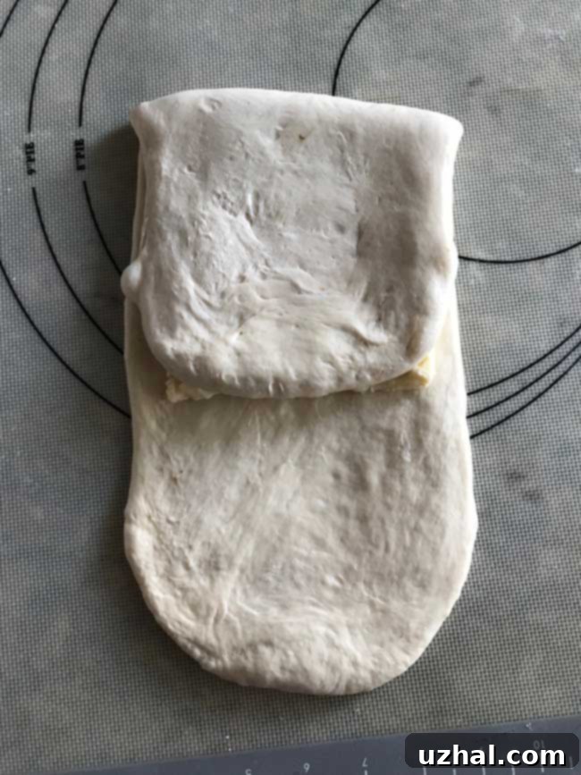 Second layer of butter added to dough