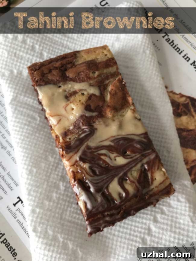 Tahini Brownies showcasing the rich texture and tahini swirl on top.