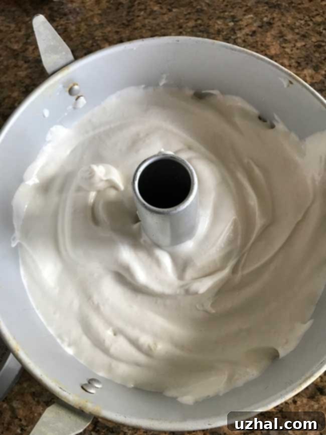 Wondra Flour Angel Food Cake cooling on a wire rack