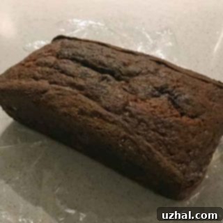Chrissy Teigen inspired banana bread with pudding mix, baked in a loaf pan, ready to serve