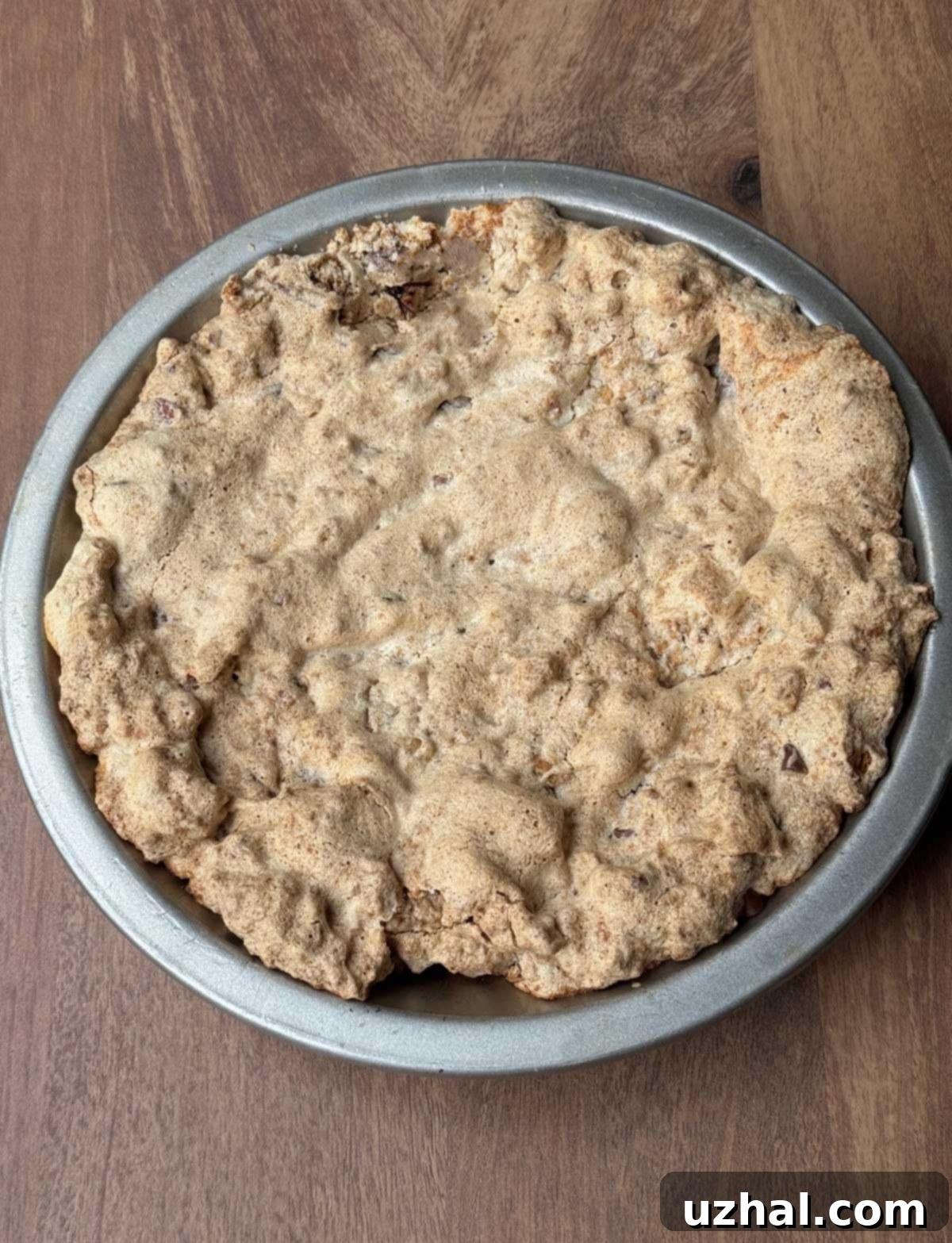 Graham Cracker Magic Pie 4 Baked Graham Cracker Surprise Pie, golden-brown and slightly textured, before being adorned with its creamy whipped topping.