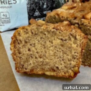 Close-up of a golden-brown Banana Bread with One Banana recipe, showcasing its inviting texture.
