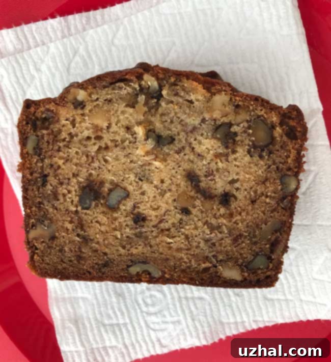 Diamond Walnut Banana Bread - A delicious loaf of homemade banana bread with walnuts, ready to be sliced and served.