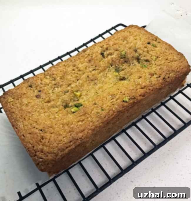 Vegan Lemon Pistachio Cake - Sliced with frosting