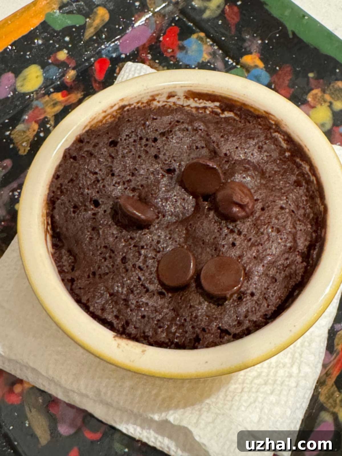 Low-calorie chocolate mug cake in a custard cup