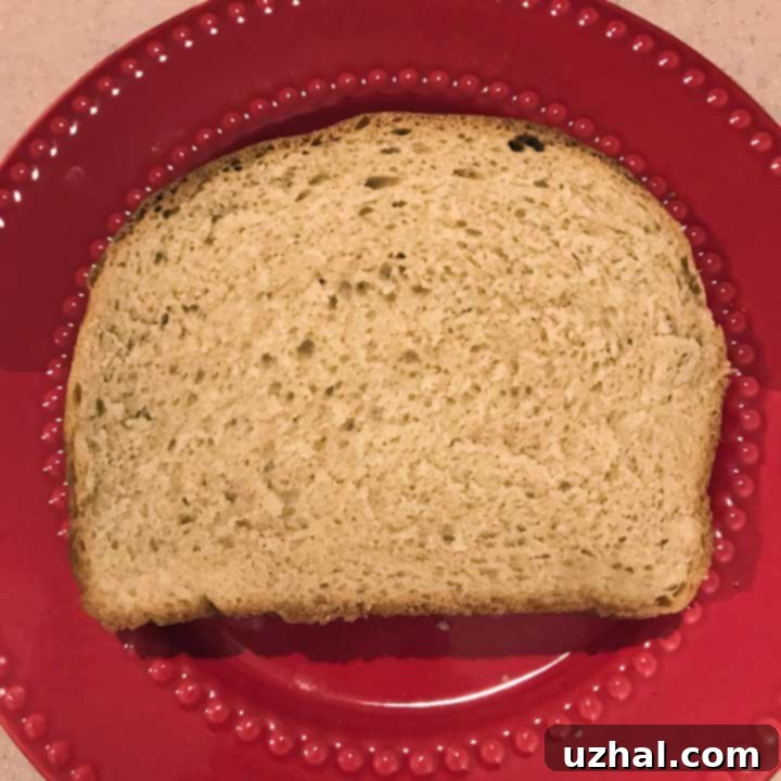 Sourdough Honey Whole Wheat Bread - A beautifully baked loaf with a golden-brown crust.