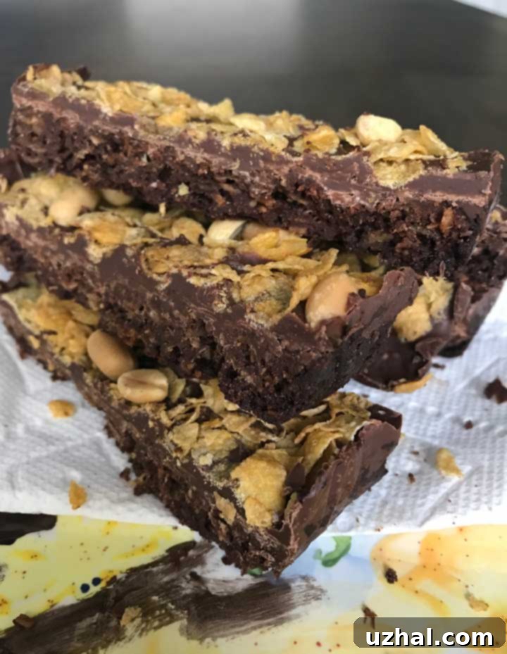 Cornflake Slice topped with melted chocolate and more Cornflakes