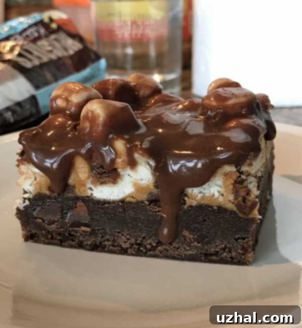 Perfectly sliced Mississippi Mud Bar showing all decadent layers