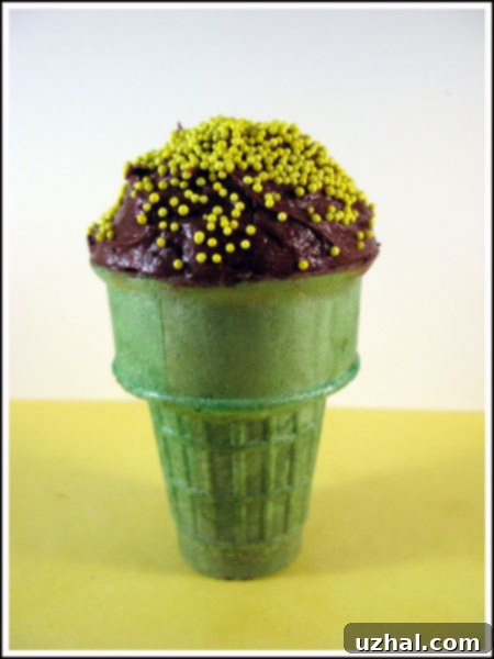 Delicious Ice Cream Cone Cupcakes with chocolate cake and smooth frosting, ready to be enjoyed.