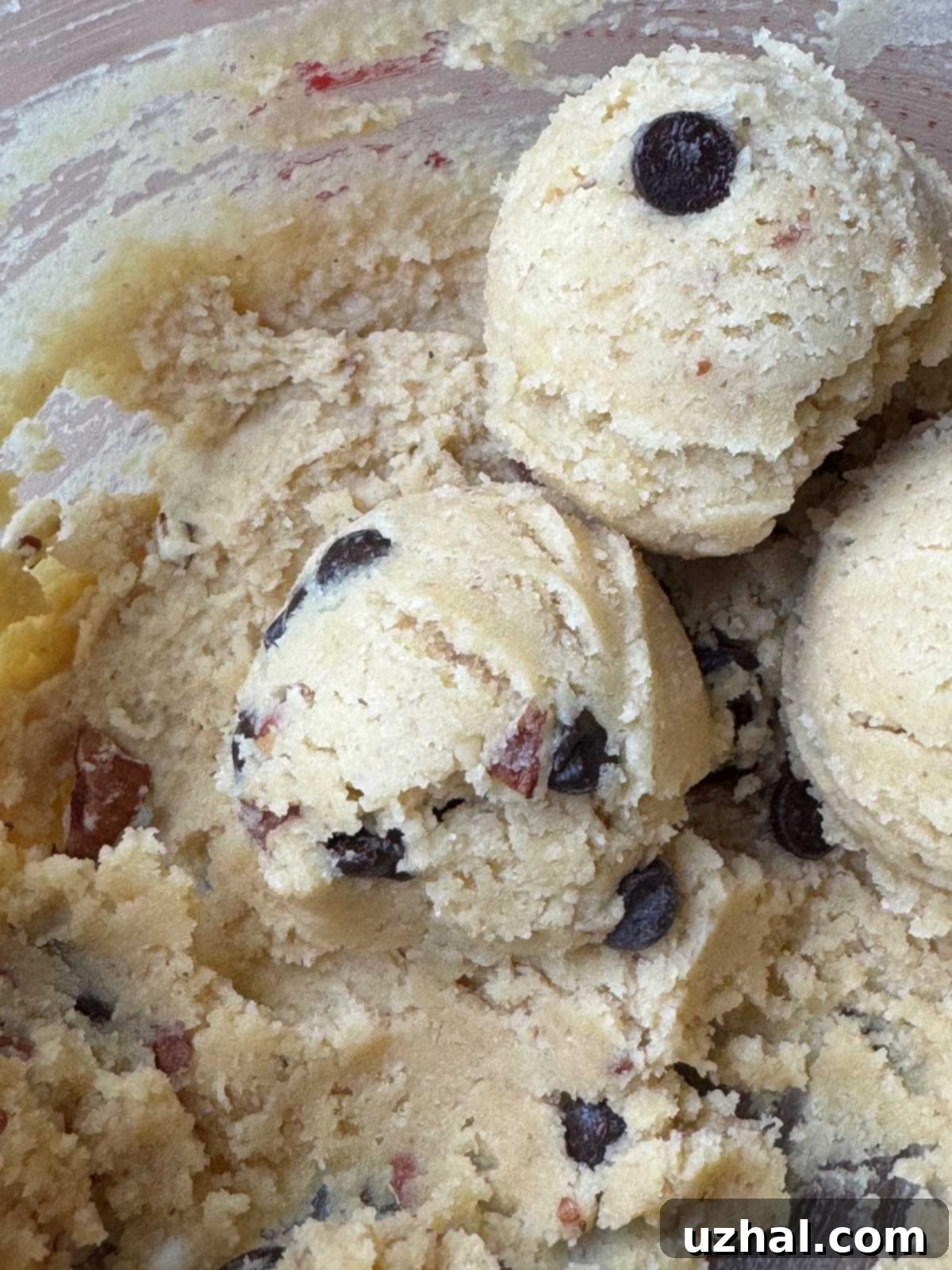 Chocolate chip cookie dough made with allulose, ready for baking.
