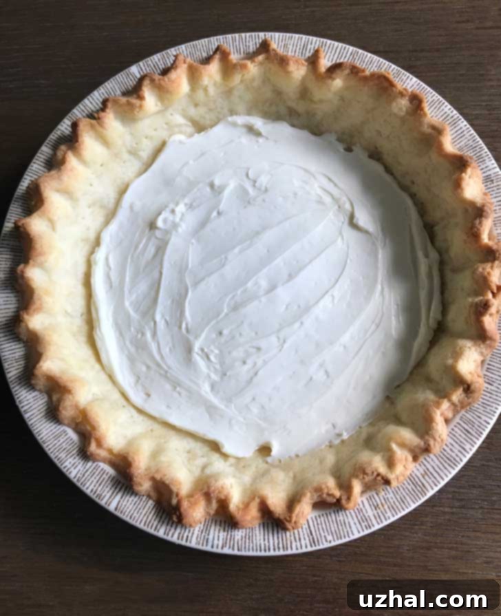 Cream cheese layer in strawberry pie