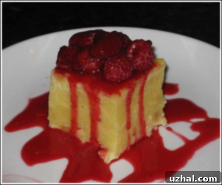 White Chocolate Challah Bread Pudding with raspberry sauce