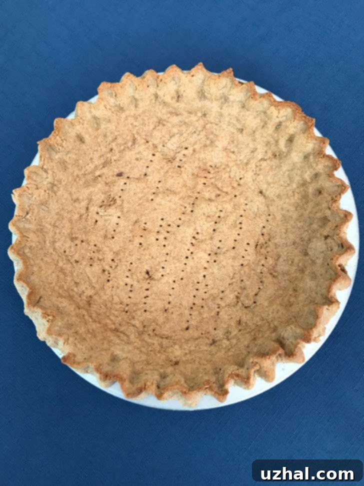 A thicker, rolled graham cracker crust ready for a generous filling.