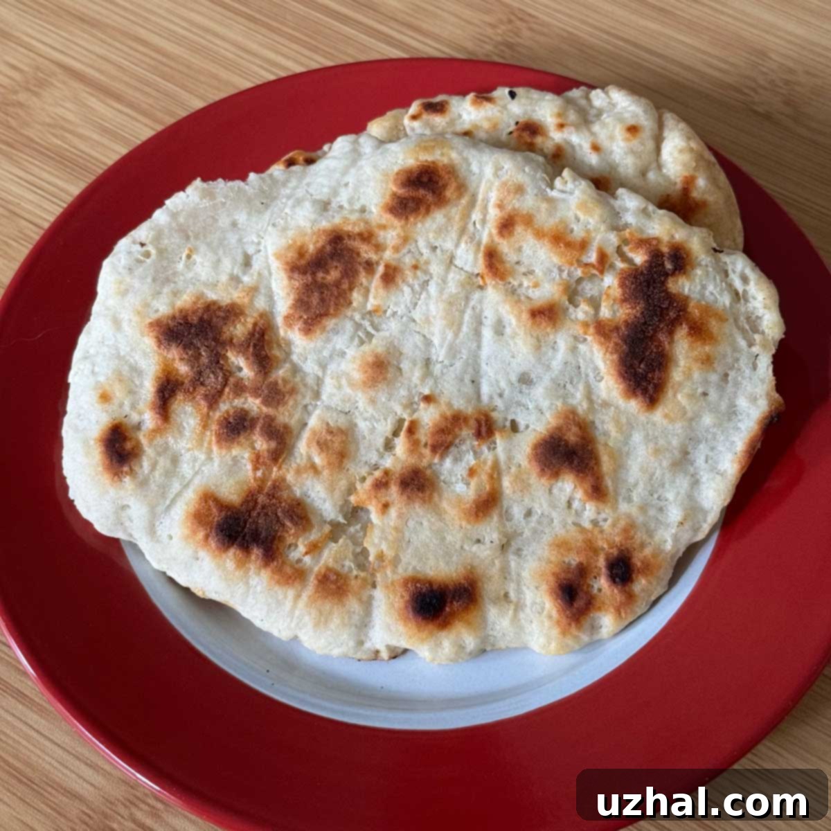 Naan One One is a quick recipe for naan made with self-rising flour and Greek yogurt.
