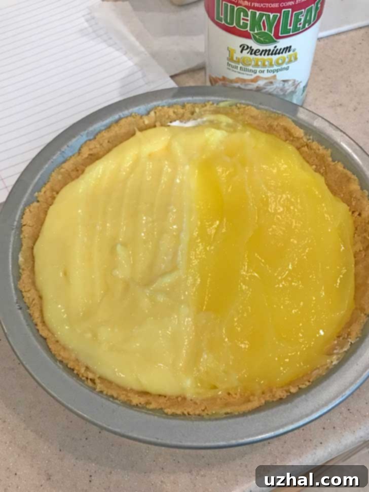 Close-up of Lemon Oreo Pie layers before chilling.
