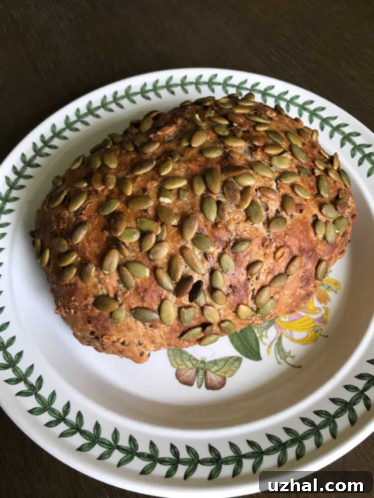 Martha Stewart's Seed Bread, a beautifully baked, golden-brown loaf with a crunchy crust and visible seeds on top.