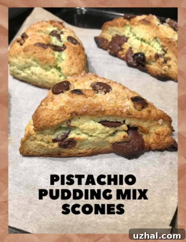Vibrant green Pistachio Pudding Mix Scones on a cooling rack, perfect for St. Patrick's Day celebration.