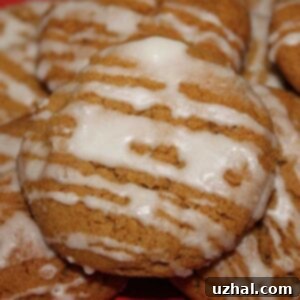 Old Fashioned Iced Molasses Cookies on a cooling rack.