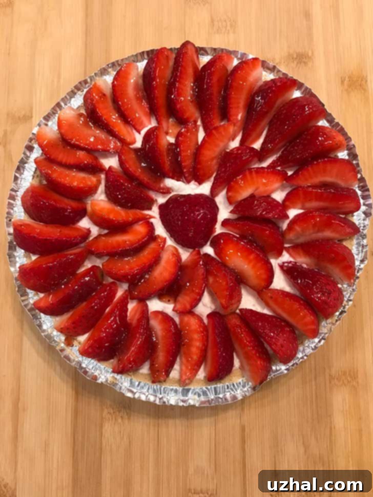 Strawberry Yogurt Pie filling in a store bought crust