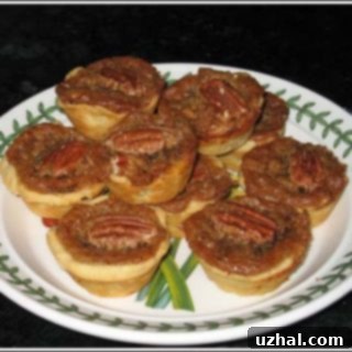 Pecan Tassies with a golden crust and rich pecan filling