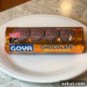 Maria Cookie Icebox Cake with whipped cream and chocolate shavings