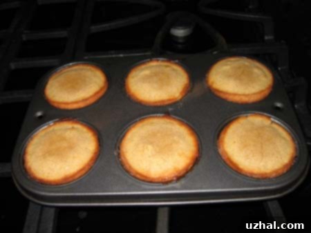 Step 5: Filling muffin cups evenly with peanut butter lava cake batter