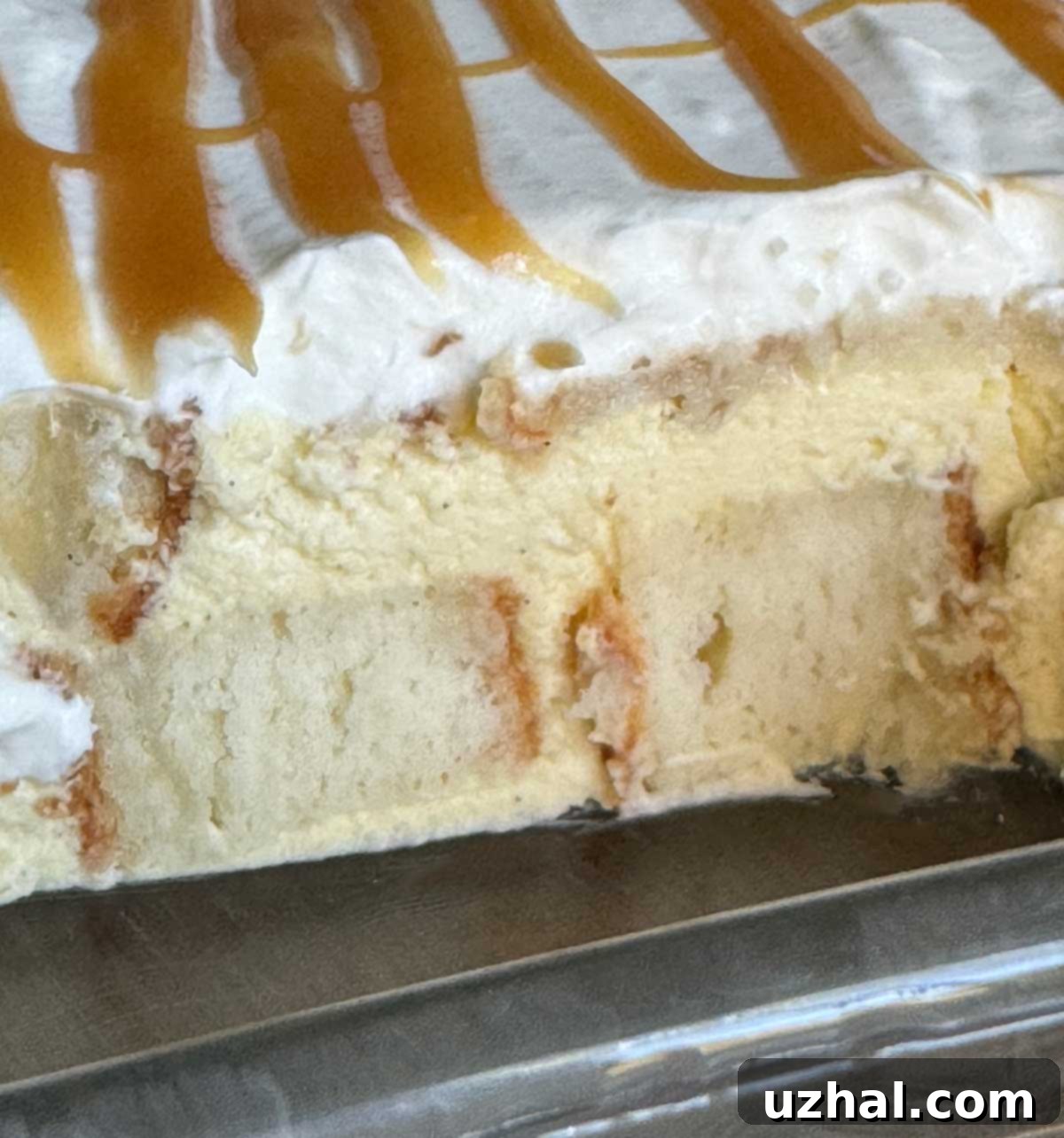 Prepared Angel Food Cake Bavarian Cream chilling in a square dish before topping.