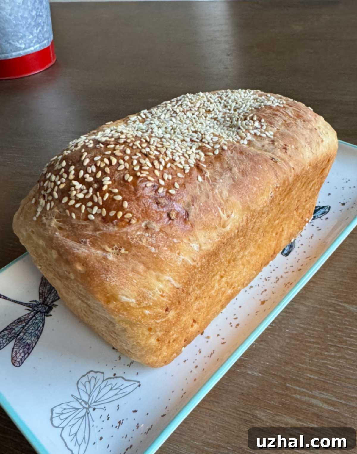 Freshly baked rice bread loaf, golden brown and ready for slicing