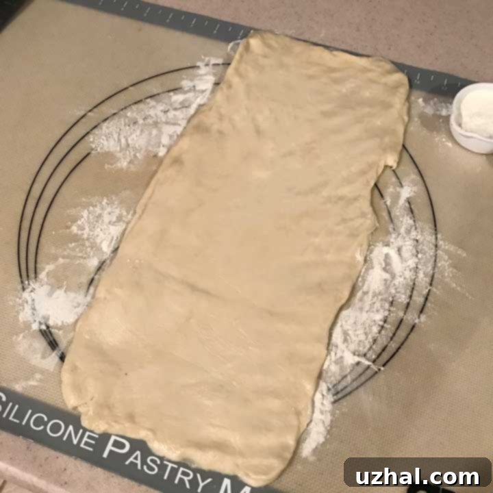 Make Ahead Cinnamon Roll Dough rolled into a rectangle for filling.