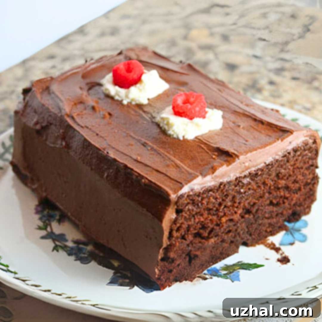 Brownstone Front Cake with chocolate frosting, garnished with chocolate shavings.