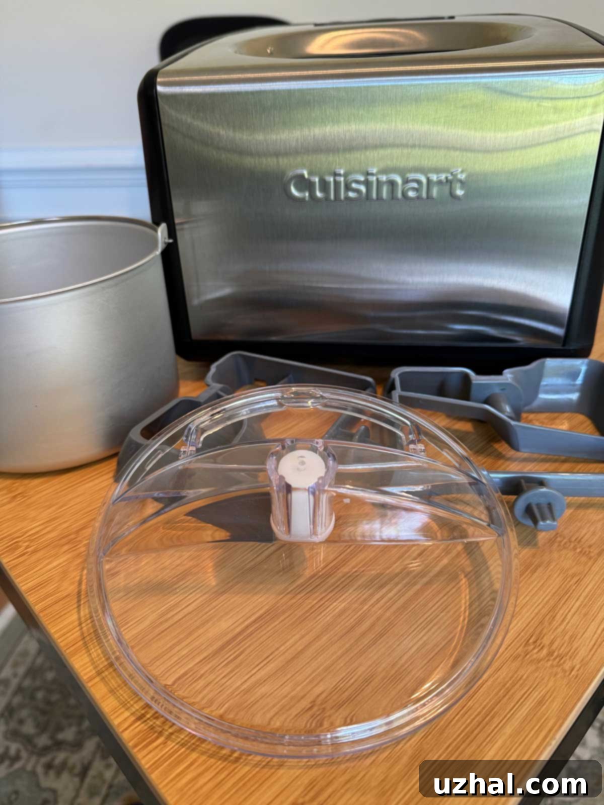 Cuisinart Ice-100 removable parts including the barrel, lid, and two dashers for ice cream and gelato