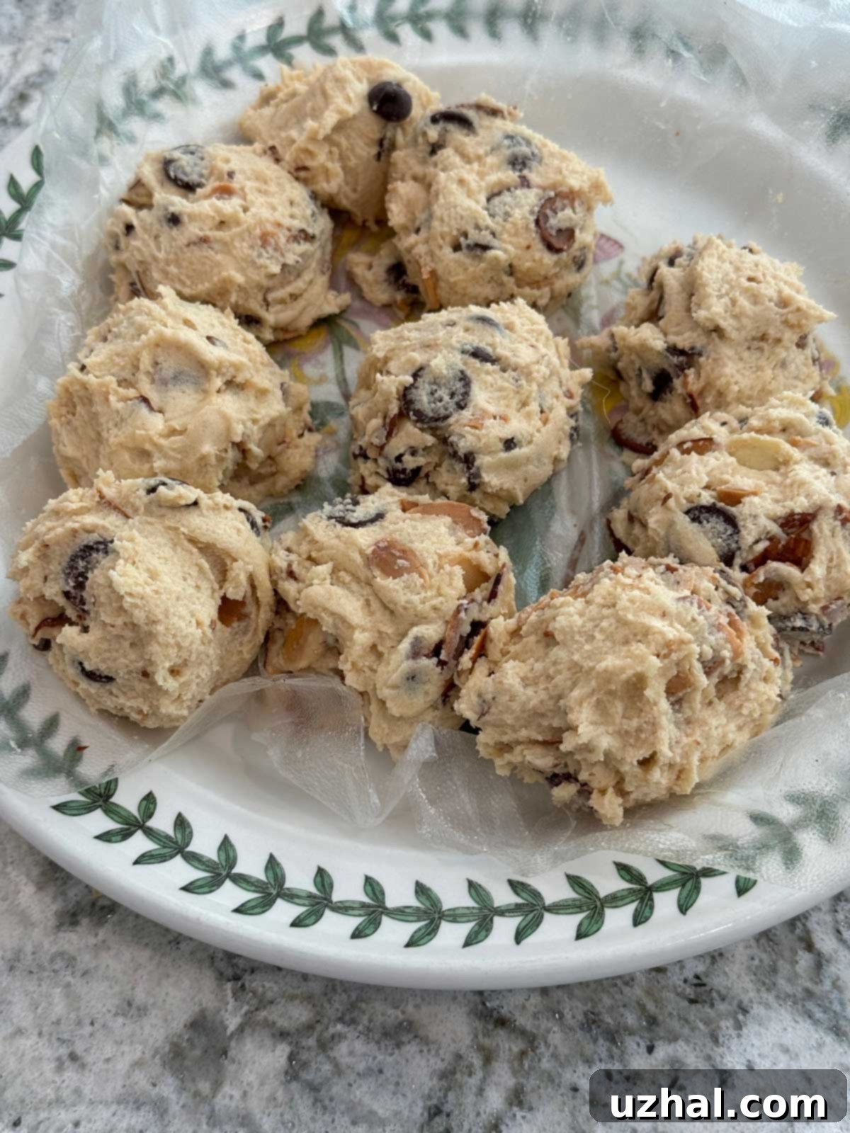 Large balls of Sarabeth's Chocolate Cloud cookie dough on a plate, ready for baking
