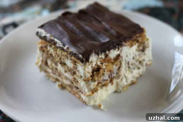 Chocolate Eclair Cake in an 8-inch square dish, ready to be chilled
