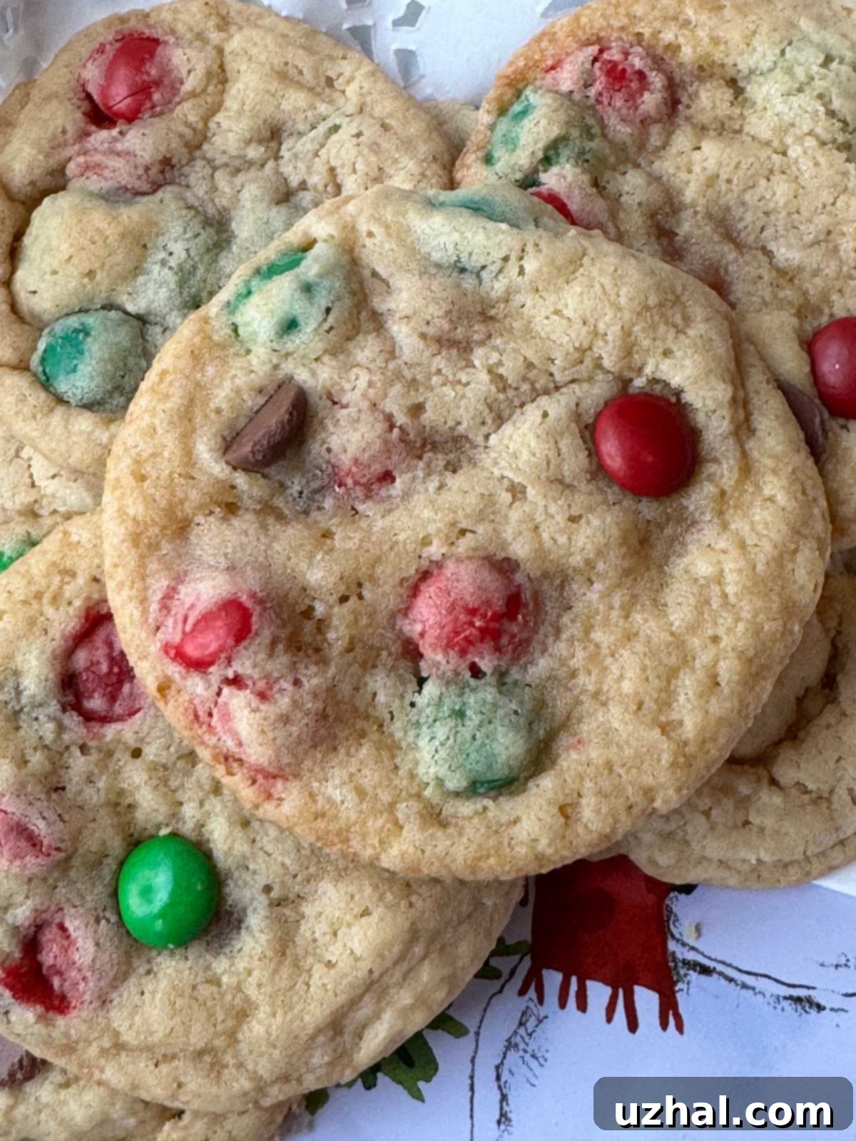 Large Batch Cake Batter M&M cookies that are flat, chewy and made with Christmas M&Ms.