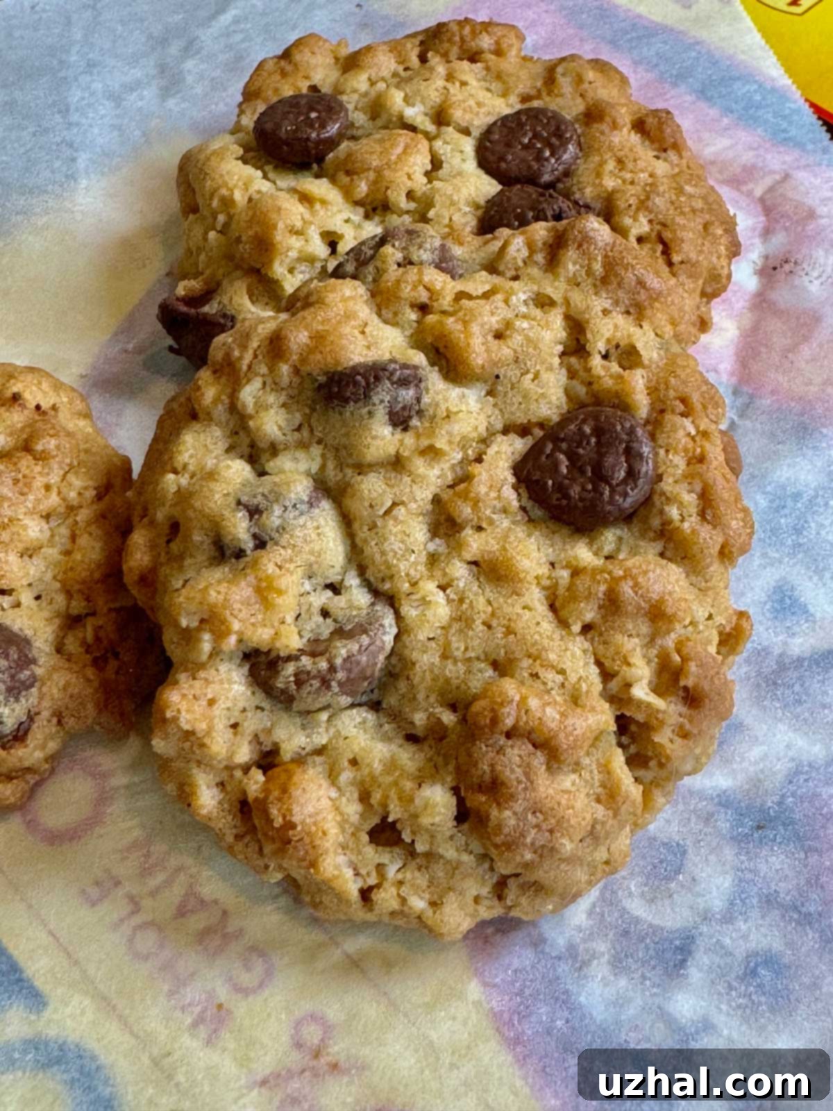 Freshly baked golden-brown Peanut Butter Cheerio Cookies on a cooling rack.