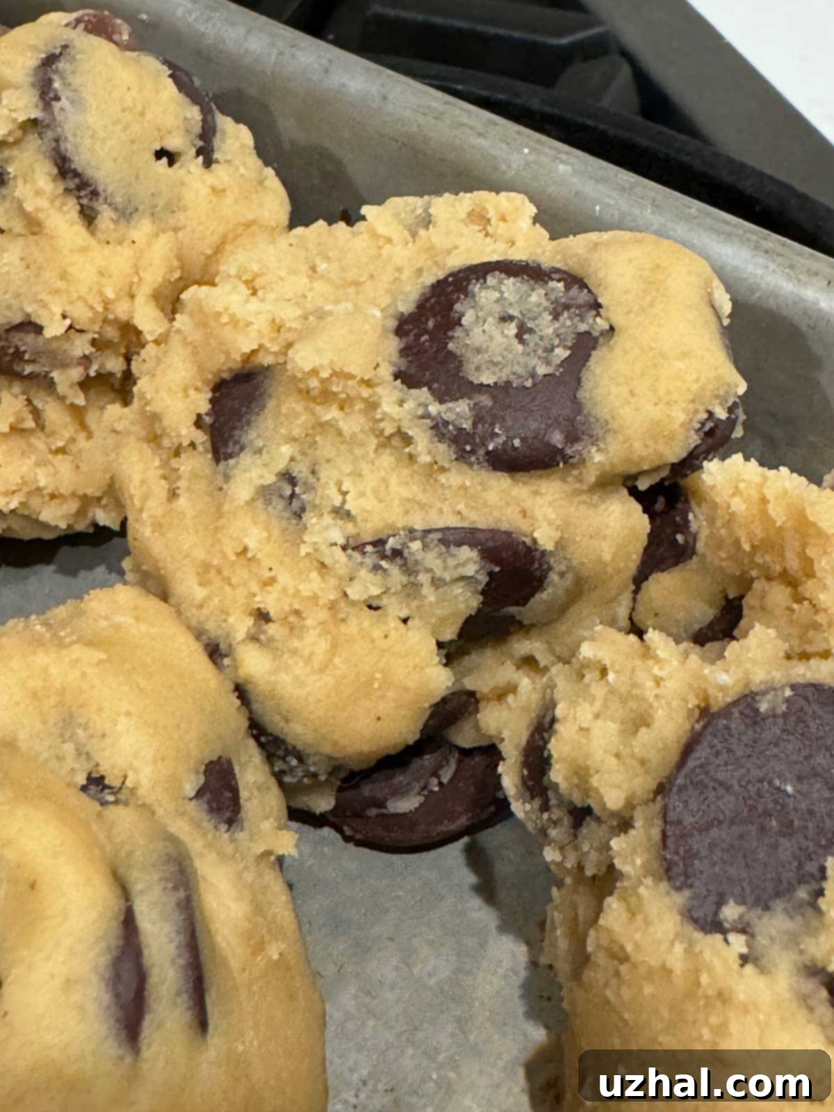 Guittard chocolate wafers, a recommended alternative to Valrhona Chocolate Féves for achieving layered chocolate in cookies.