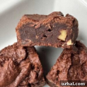 Double chocolate almond flour brownie cut to show texture.