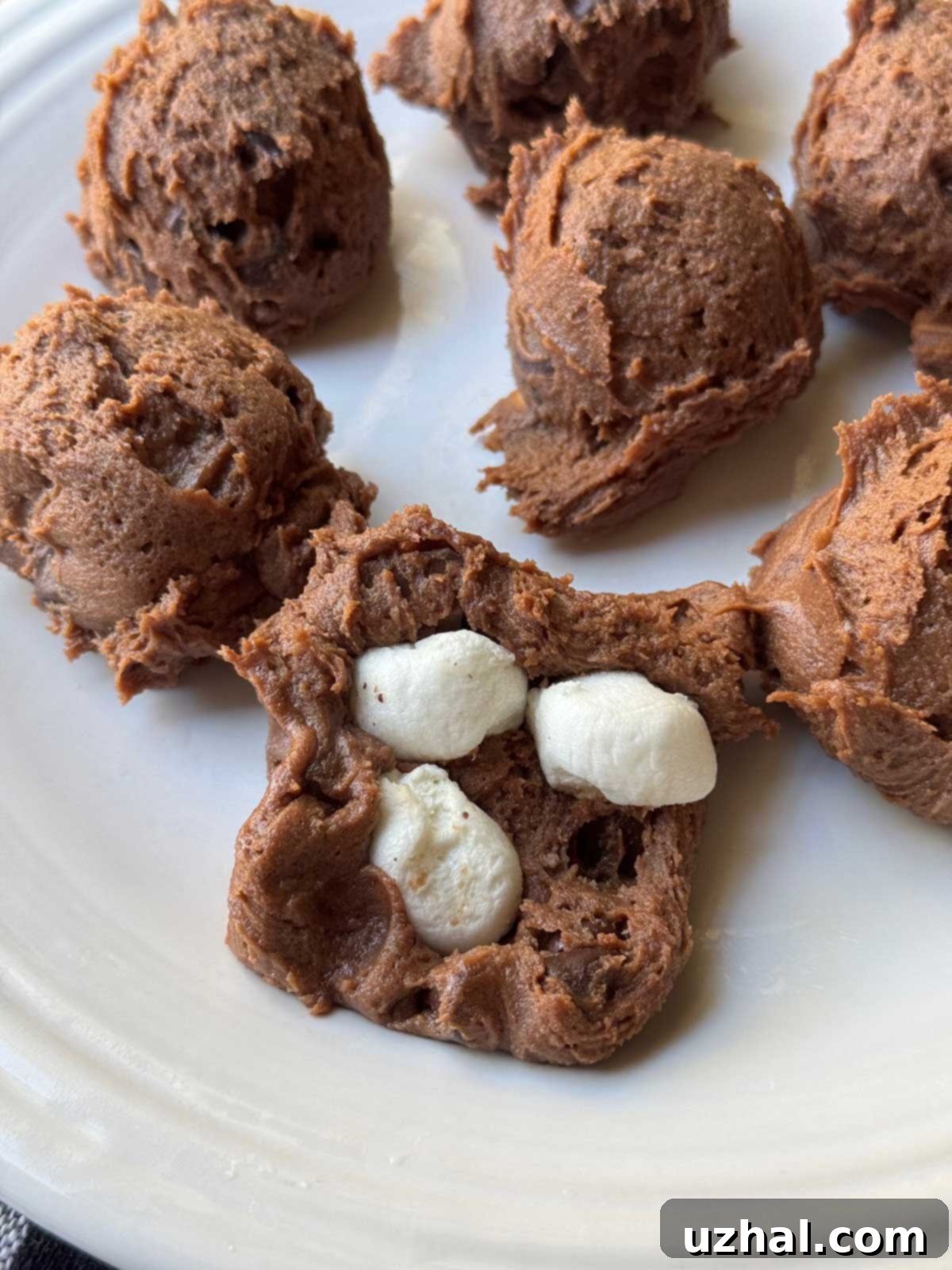 Espresso Marshmallow Delights 3 Espresso Marshmallow Cookies dough being stuffed with pieces of frozen marshmallow.
