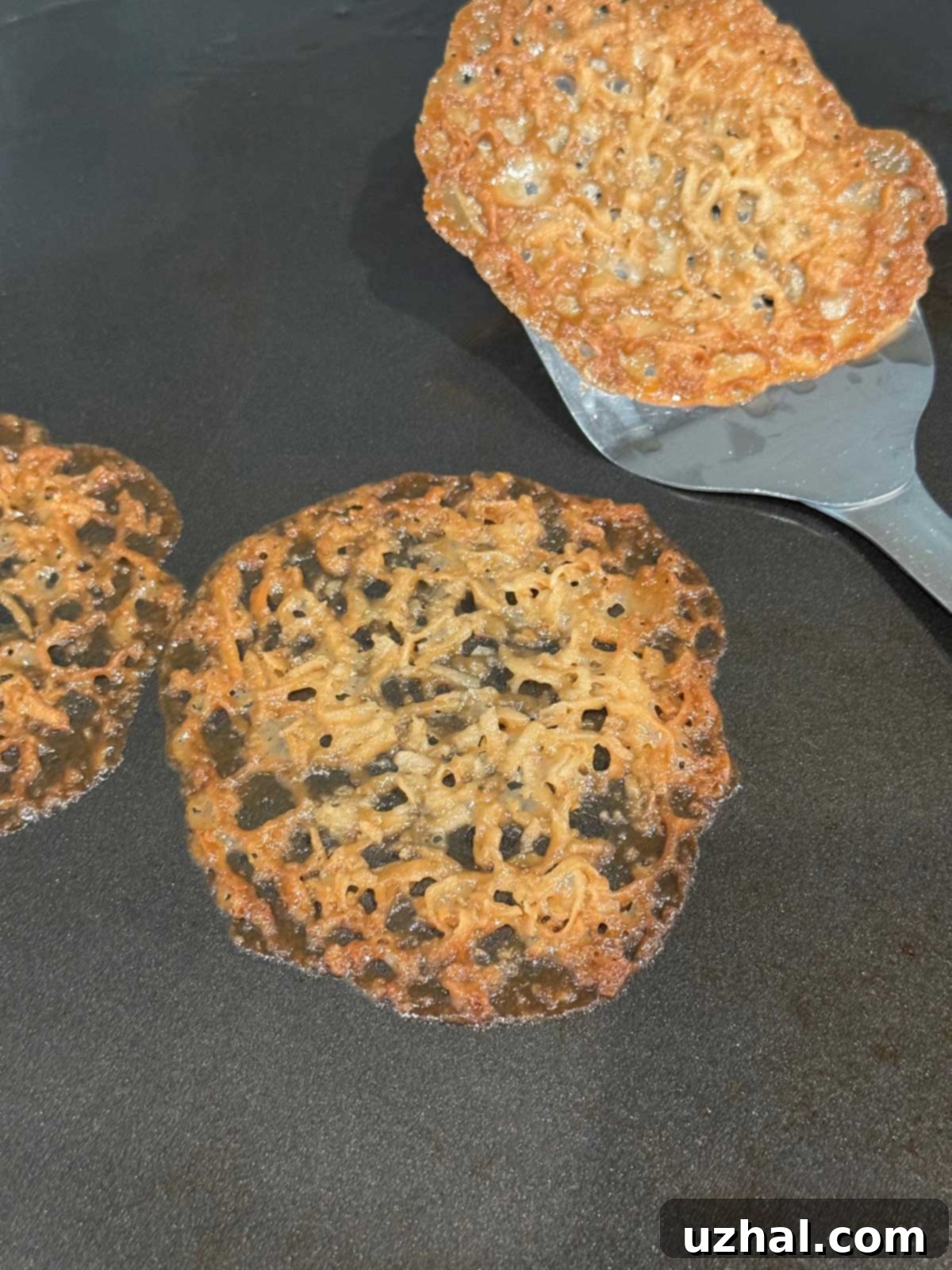 Lady Bird Johnson's Signature Lace Cookies 4 Lace cookies baked on an insulated sheet pan without parchment paper.