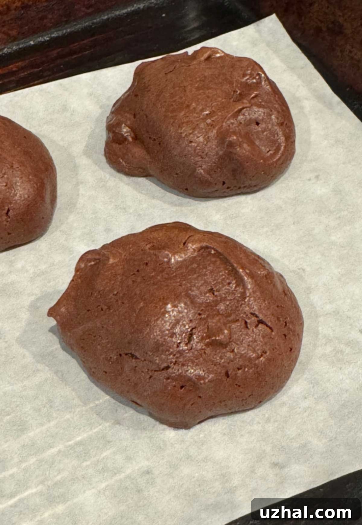 Fudgy Palmer House Brownie Delights 5 Freshly baked brownie cookies without any glaze or topping, showcasing the desirable glossy, crinkled tops achieved with the secret vodka ingredient for optimal texture.