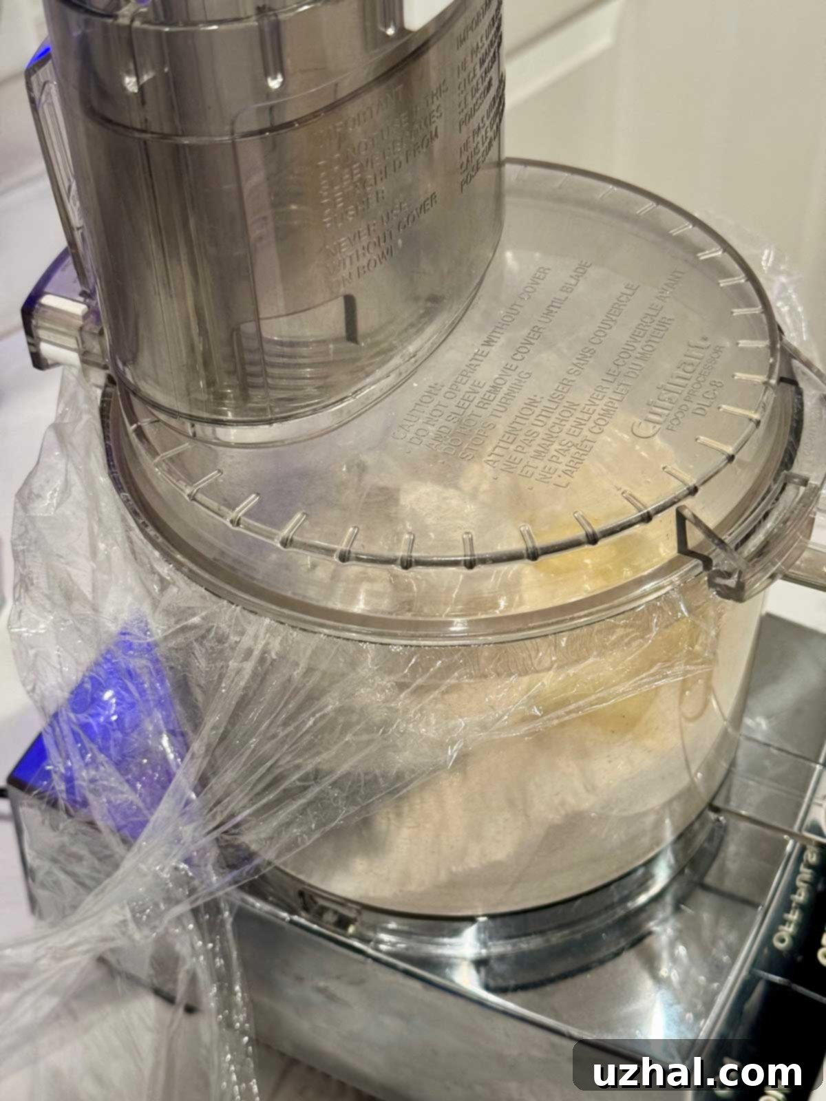 Lay plastic wrap over food processor before putting on the lid for easy clean-up.