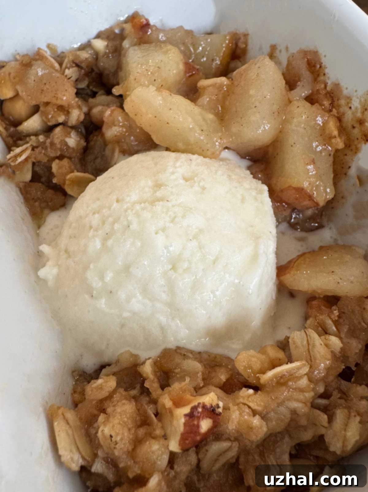 Small-Batch Pear Crumble 4 Recipe for Small Batch Pear Crisp or Crisps served with a scoop of vanilla ice cream.