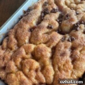 Moravian Sugar Cake or Cardamom Bun Cake with a wavy, wrinkled top.