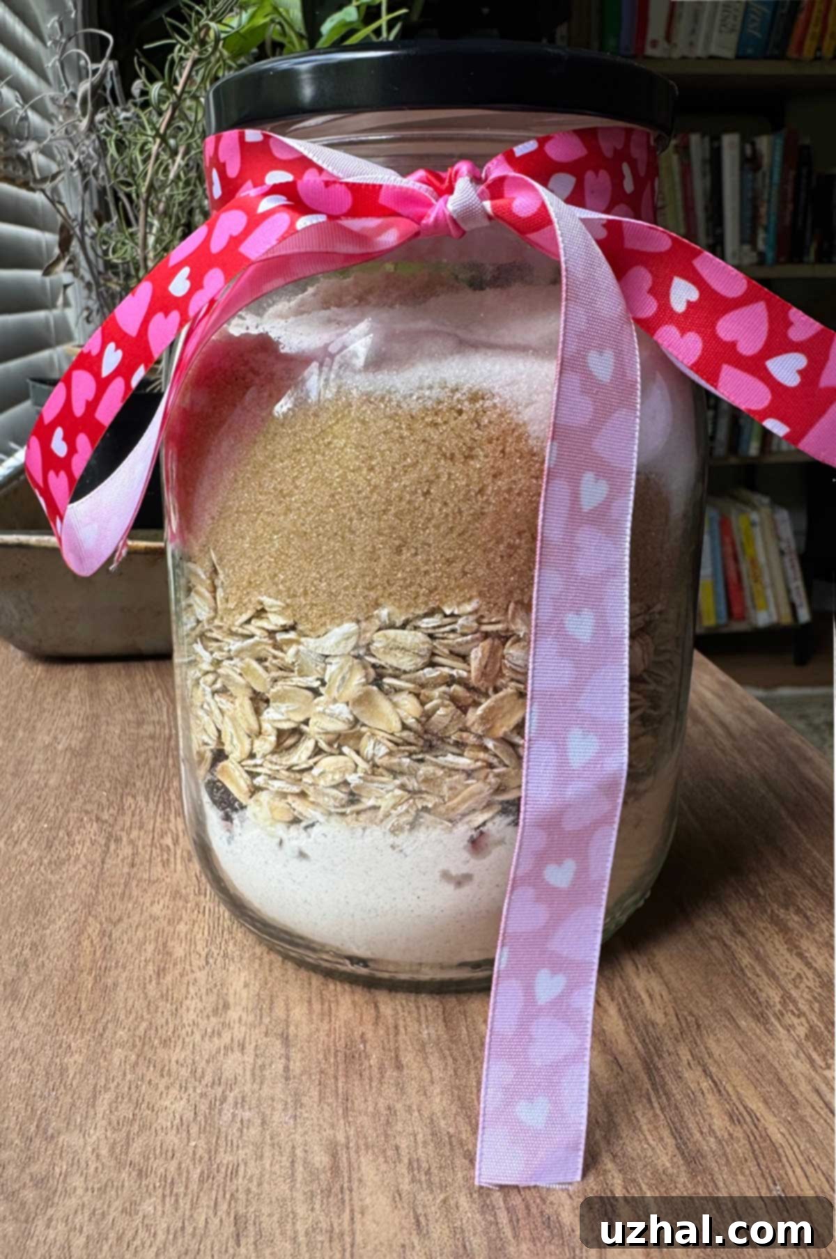 Layered oatmeal cookie mix in a mason jar